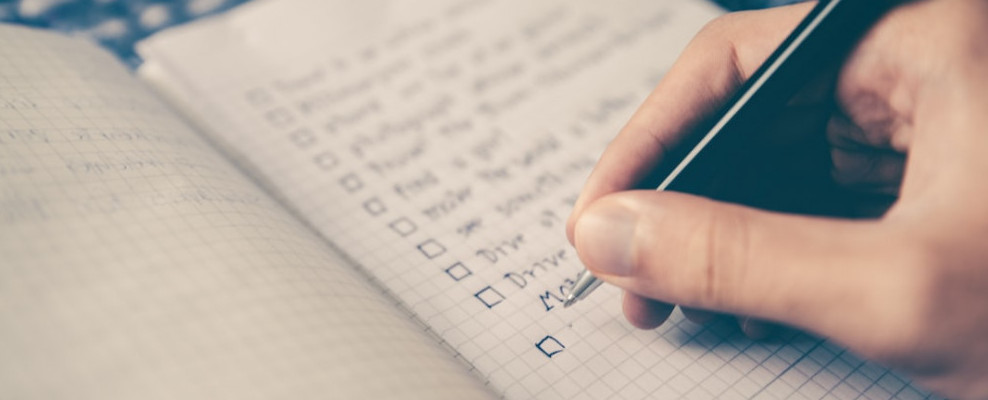Picture a person checking off tasks on a to-do list